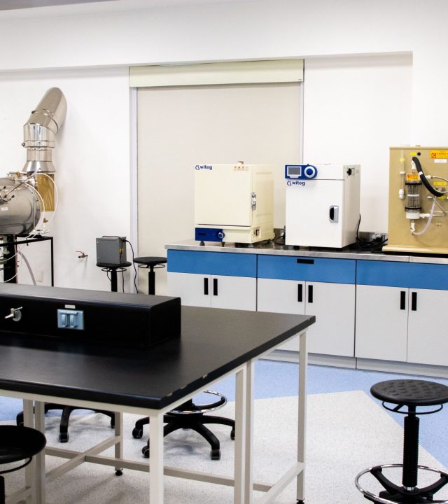 Interior view of a high-tech laboratory with cutting-edge equipment and furniture.